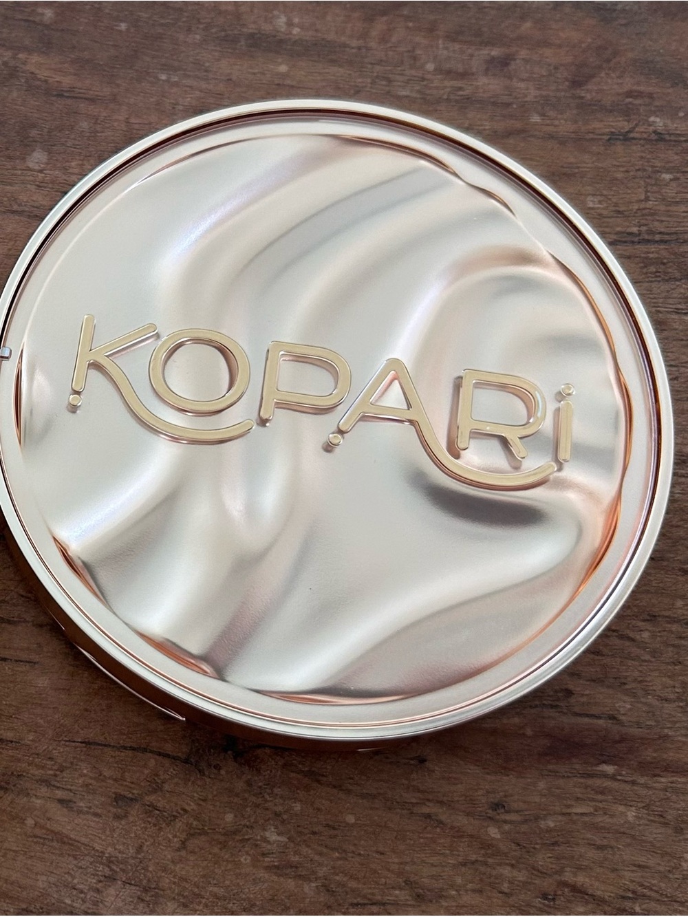 Kopari Metallic Mineral Based SPF Zinc Oxide Compact Illuminator.